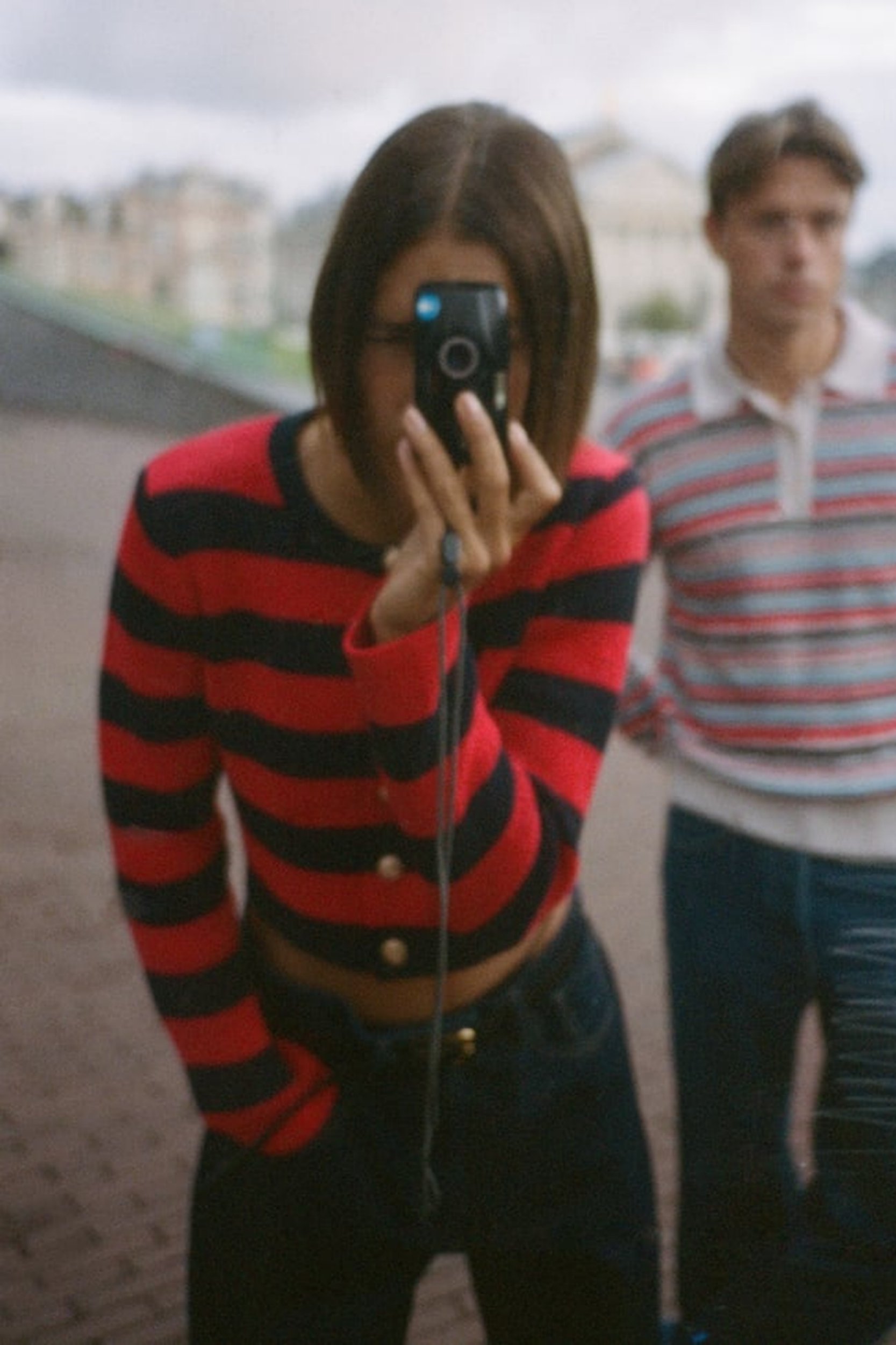 STRIPED KNIT CARDIGAN WITH GOLD BUTTONS CAMPAIGN. IMAGE ZARA.