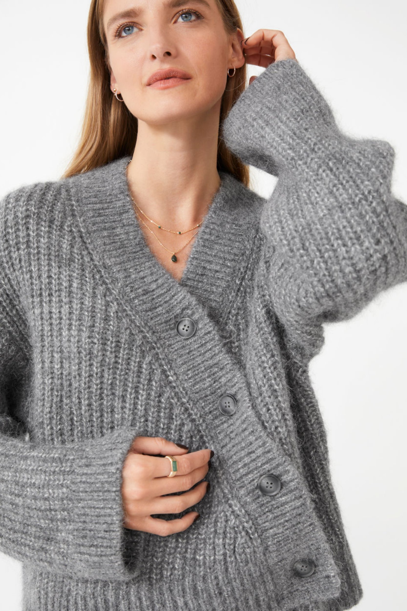 Relaxed Overlap Knit Cardigan model. Image Stories.